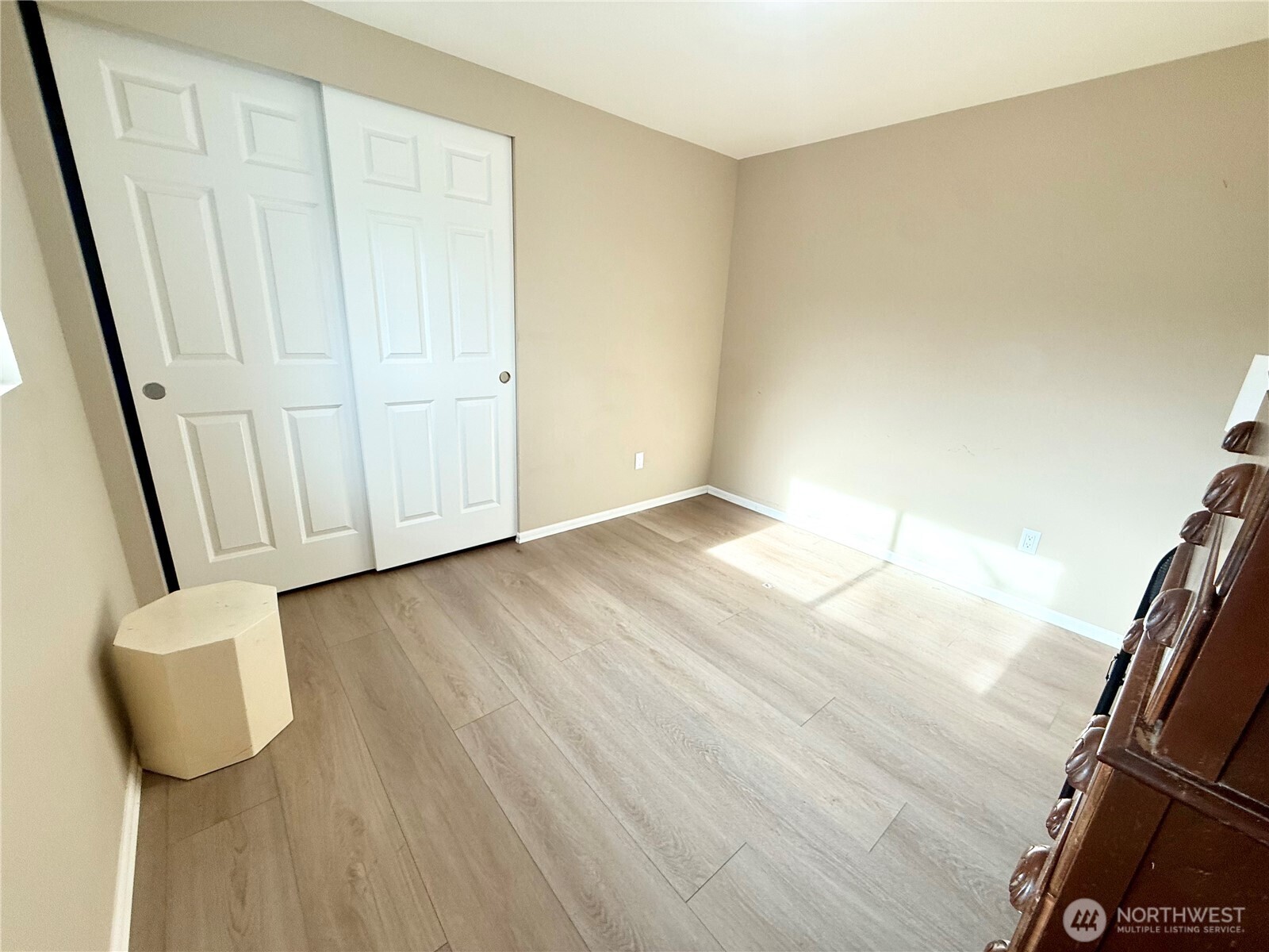 11049 18th Avenue Southwest Seattle, WA 98146 - Photo 22 of 40 a view of a hallway with wooden floor