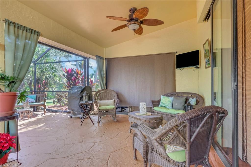 478 Countryside Drive Naples, FL 34104 - Photo 29 of 46 a view of a livingroom with furniture and a flat screen tv