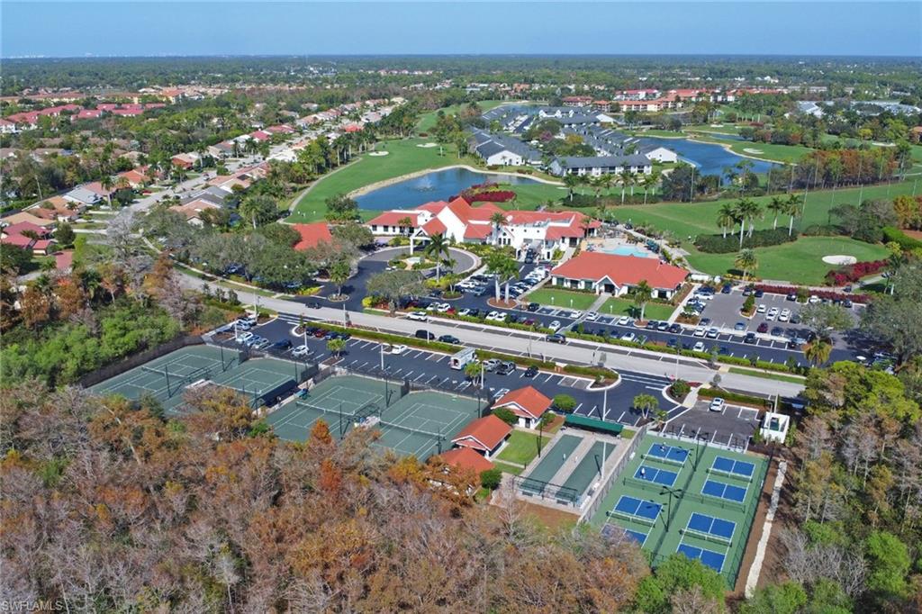 478 Countryside Drive Naples, FL 34104 - Photo 43 of 46 an aerial view of residential houses with outdoor space and swimming pool