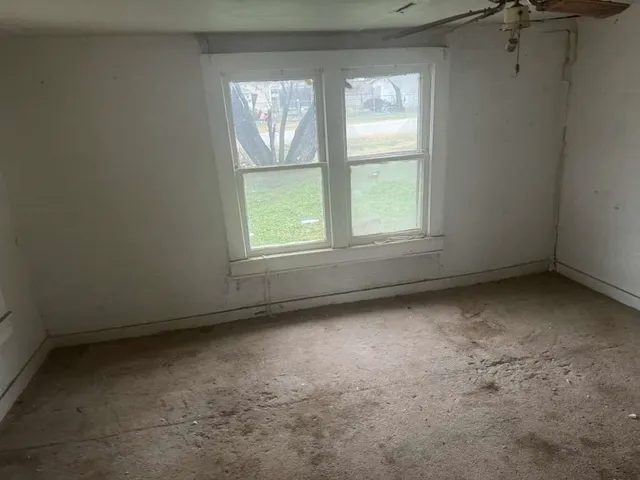 an empty room with a window