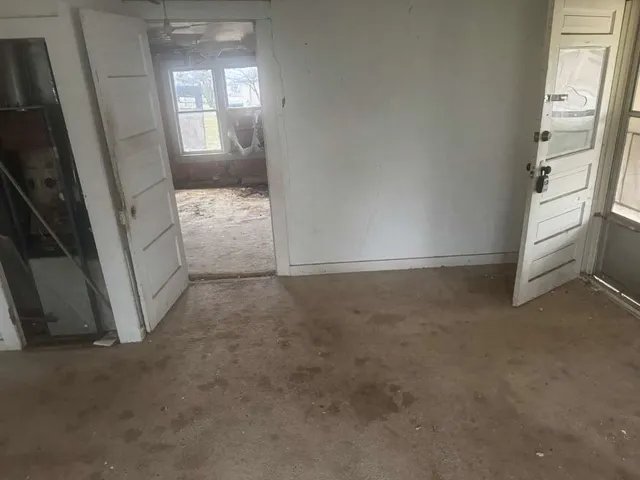 an empty room with windows