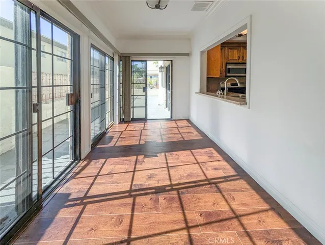 a kitchen with granite countertop cabinets and steel stainless steel appliances