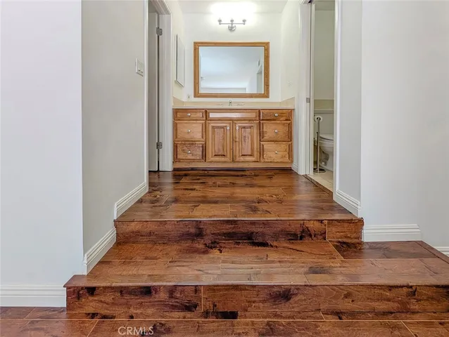 a bathroom with a toilet and shower