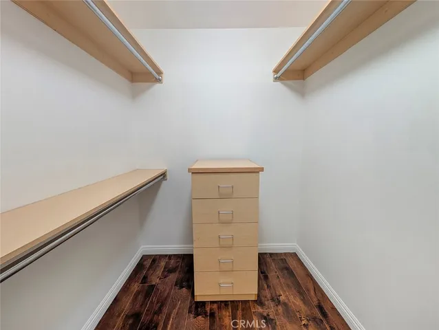 a view of a balcony with wooden floor and stairs