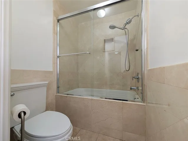 a view of a garage with wooden floors
