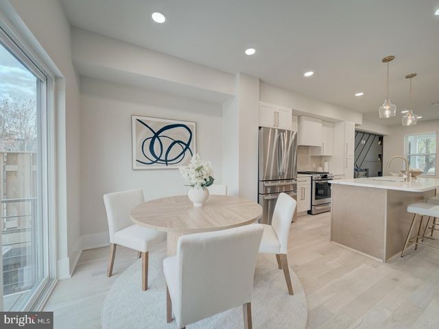 a room with a bed and a view of bathroom