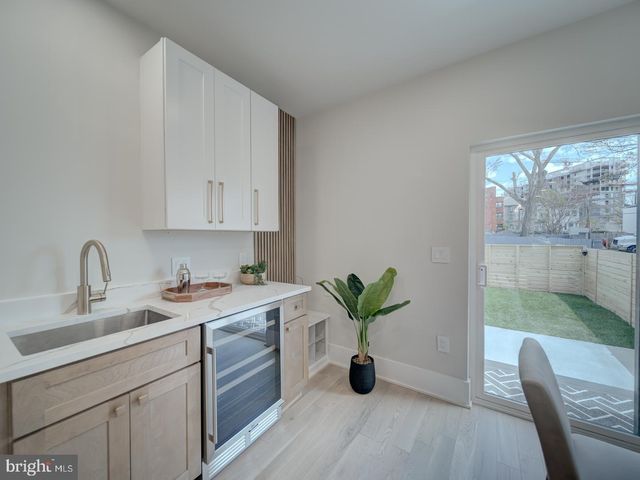 a bedroom with a bed and pillows