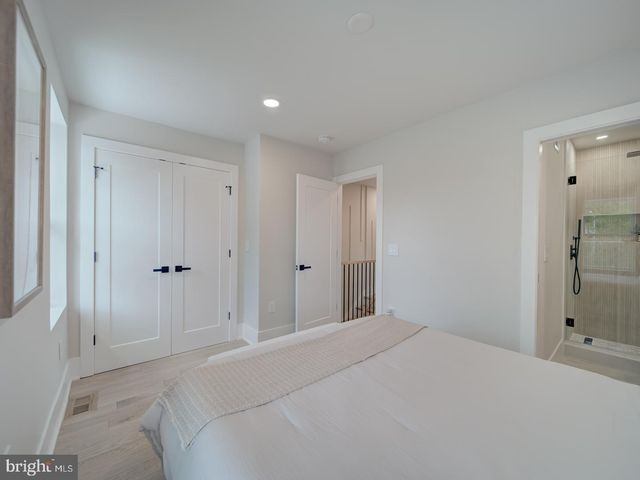 a view of a workspace with a cabinet and a couch