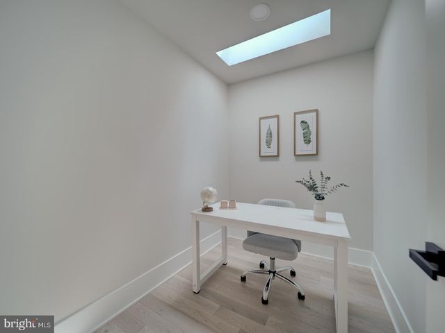 a bathroom with a shower and a tub