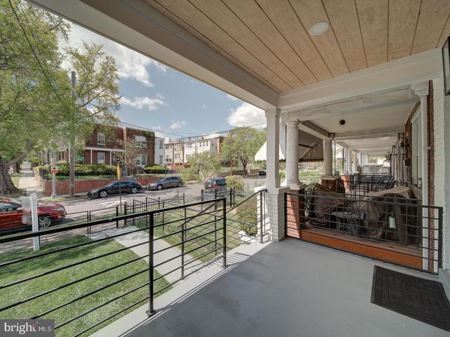 a view of livingroom with furniture and windows