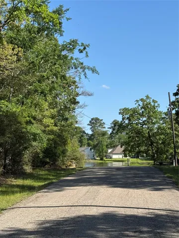 a view of a yard with an ocean view