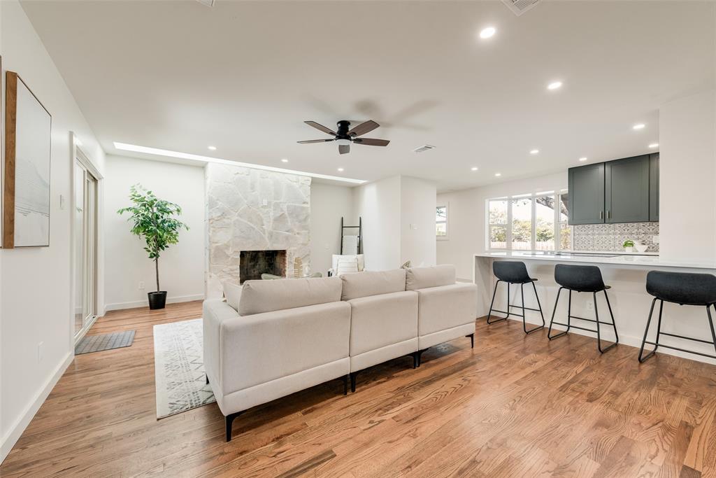 3106 Sharpview Lane Dallas, TX 75228 - Photo 12 of 31 a living room with furniture and a fireplace
