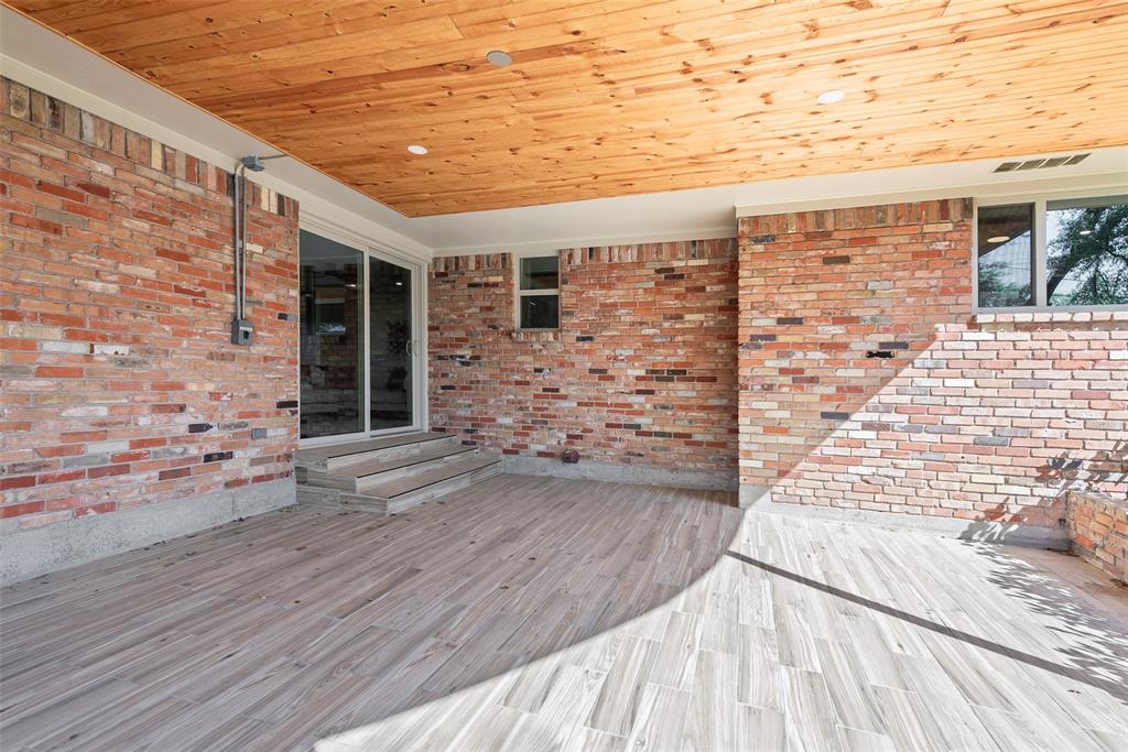 3106 Sharpview Lane Dallas, TX 75228 - Photo 29 of 31 a view of empty room with wooden floor