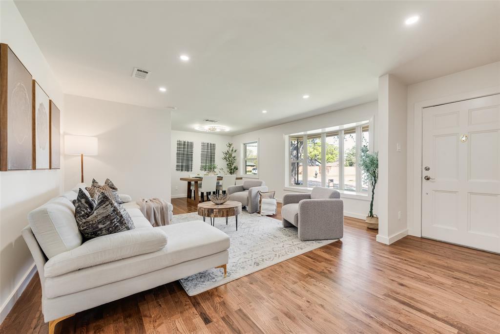 3106 Sharpview Lane Dallas, TX 75228 - Photo 3 of 31 a living room with furniture and wooden floor
