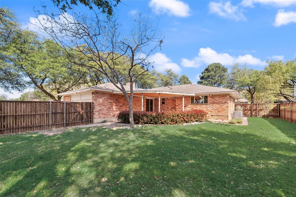 3106 Sharpview Lane Dallas, TX 75228 - Photo 30 of 31 a front view of a house with a yard
