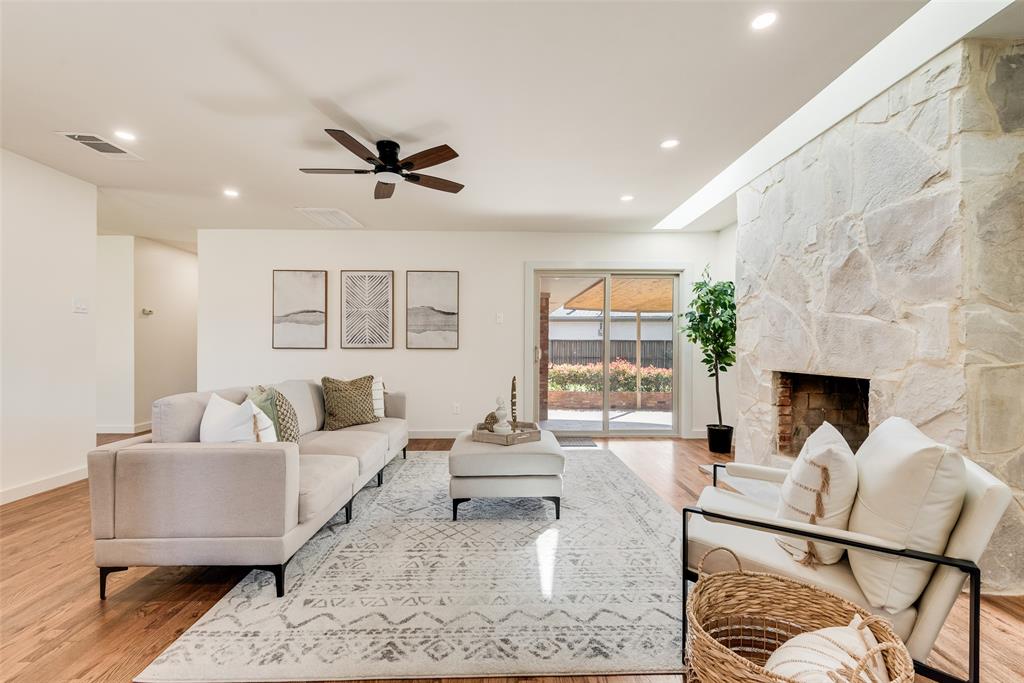 3106 Sharpview Lane Dallas, TX 75228 - Photo 8 of 31 a living room with furniture and a fireplace
