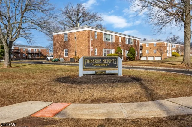 a view of a building with a street