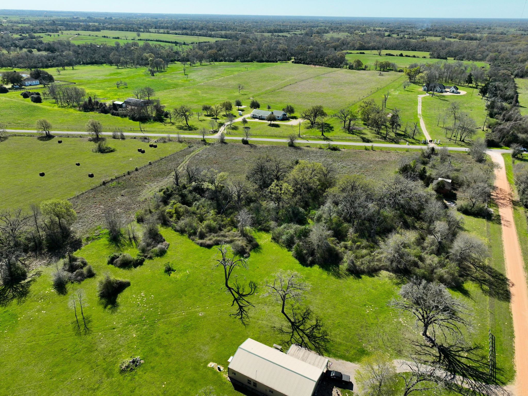 21100 Telephone Road Hempstead, TX 77445 - Photo 14 of 34 an aerial view of a houses with a yard