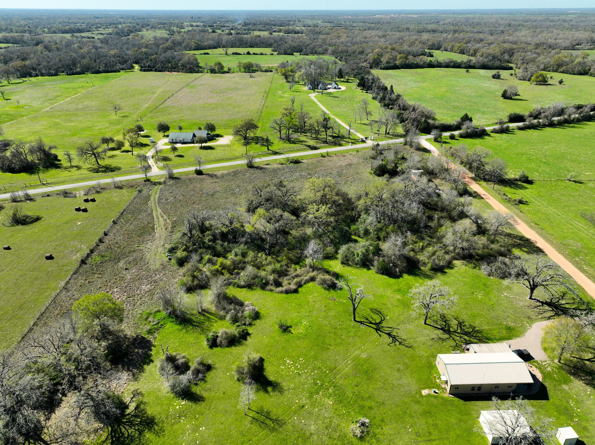 21100 Telephone Road Hempstead, TX 77445 - Photo 30 of 34 an aerial view of a houses with a yard