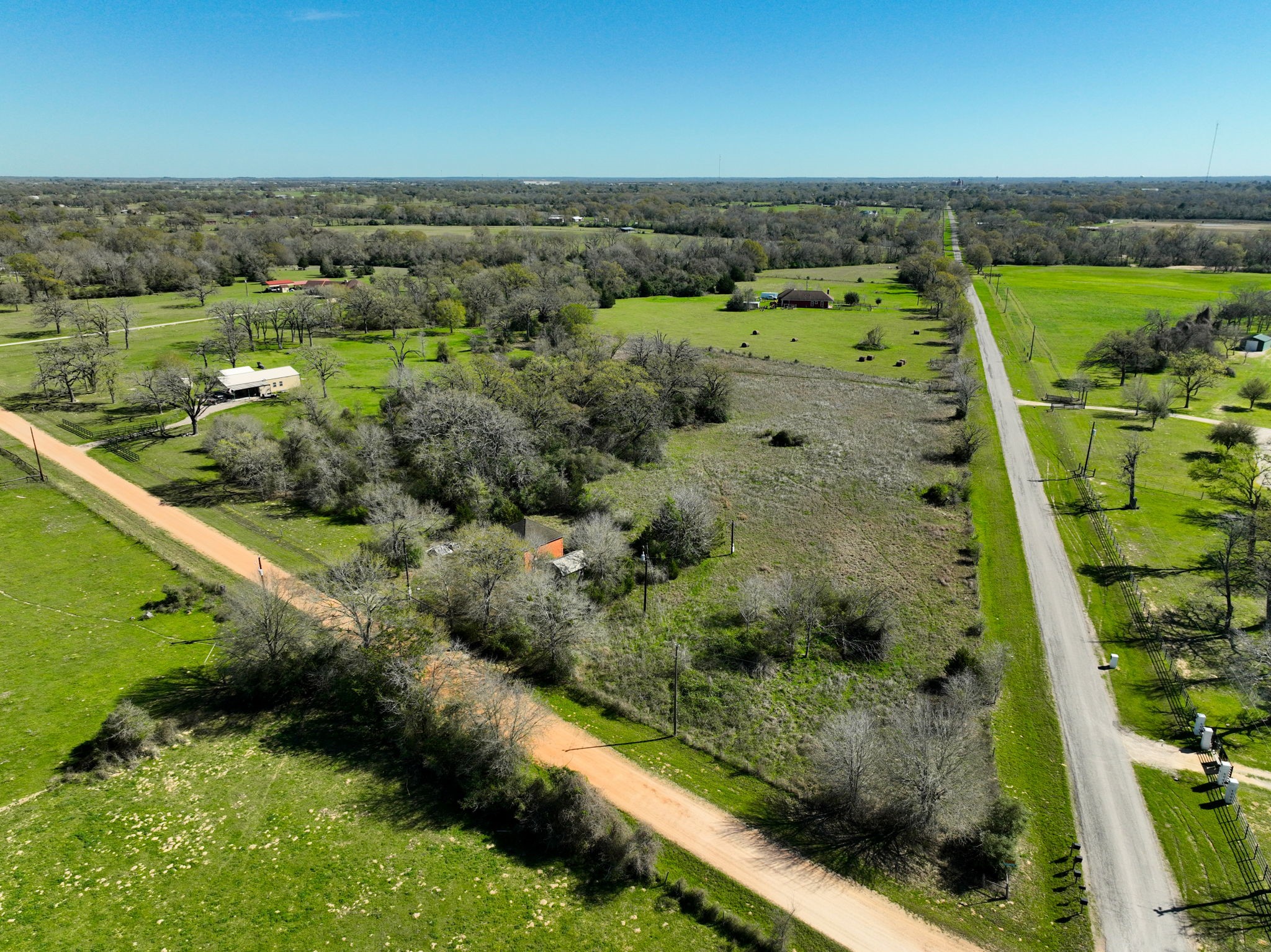 21100 Telephone Road Hempstead, TX 77445 - Photo 31 of 34 an aerial view of a house with a yard