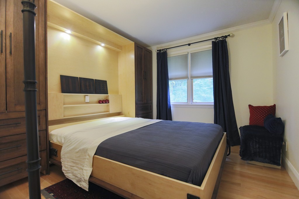 107 Park Road Chelmsford, MA 01824 - Photo 12 of 17 a bedroom with a bed and glass window