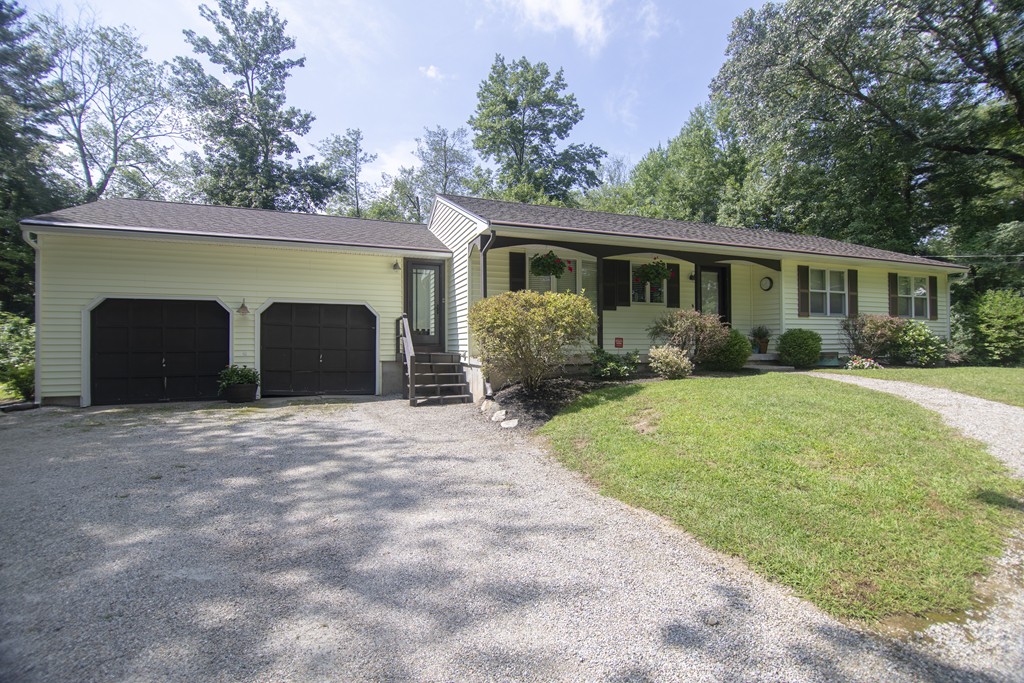 107 Park Road Chelmsford, MA 01824 - Photo 2 of 17 a front view of house with yard and green space