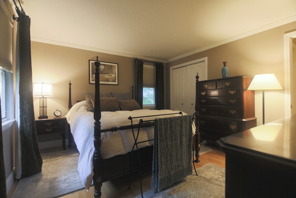 107 Park Road Chelmsford, MA 01824 - Photo 10 of 17 a bed room with a bed and a television