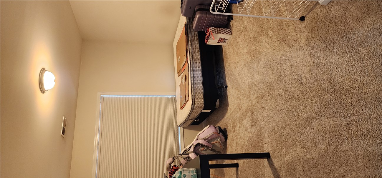 140 Sunny Point Loop Central, SC 29630 - Photo 21 of 31 Well-lit room with ample floor space and a neutral carpet.
