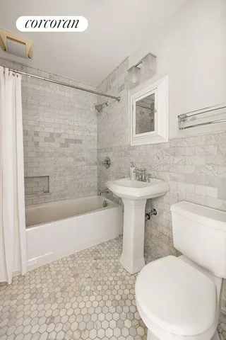 a spacious bedroom with a bed and a table