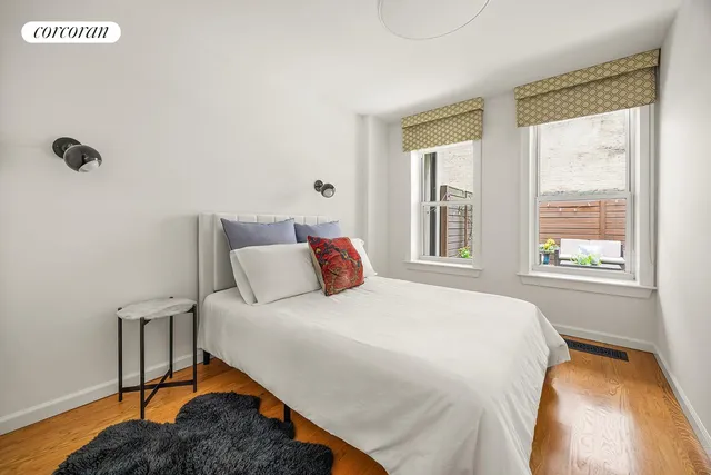 a kitchen with stainless steel appliances granite countertop a stove top oven a sink and cabinets