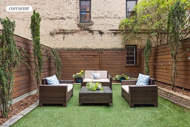 a bathroom with a toilet sink and shower