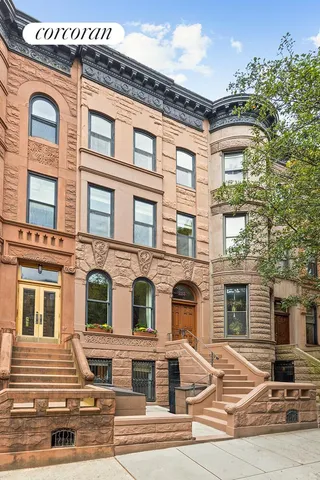 a house view with sitting space and garden
