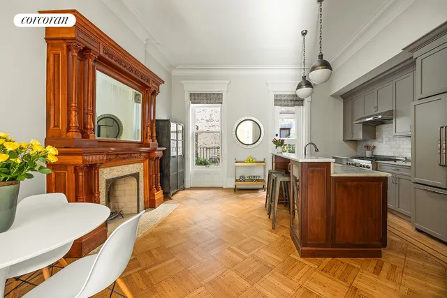 a kitchen with a sink and refrigerator