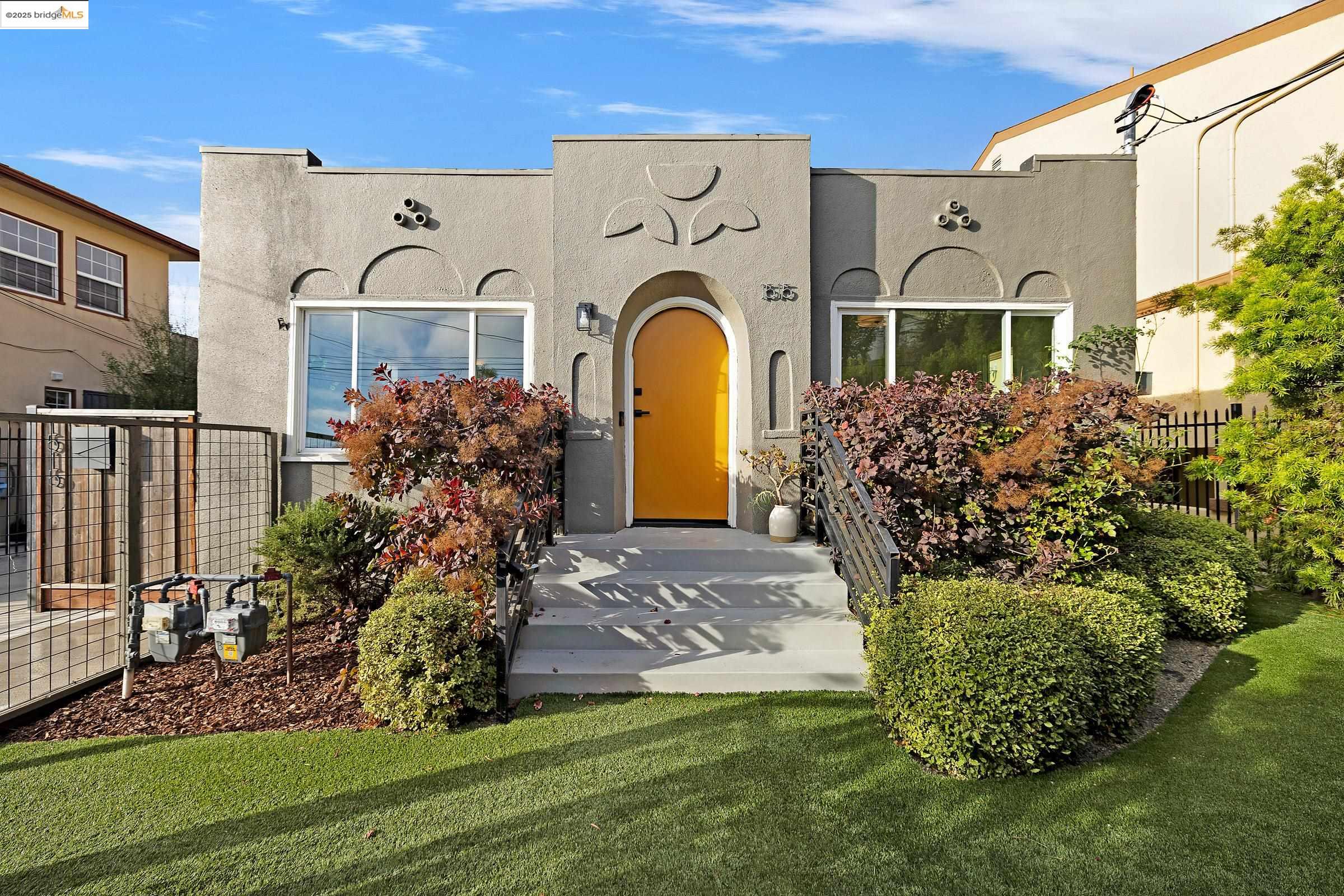 a front view of a house with garden