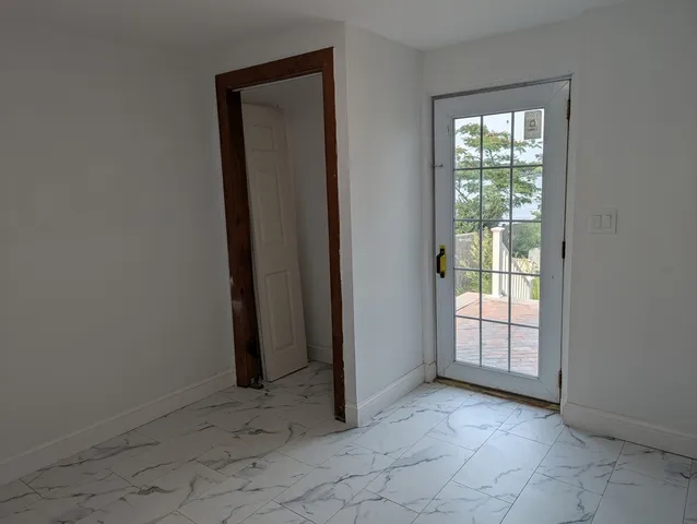 an empty room with windows