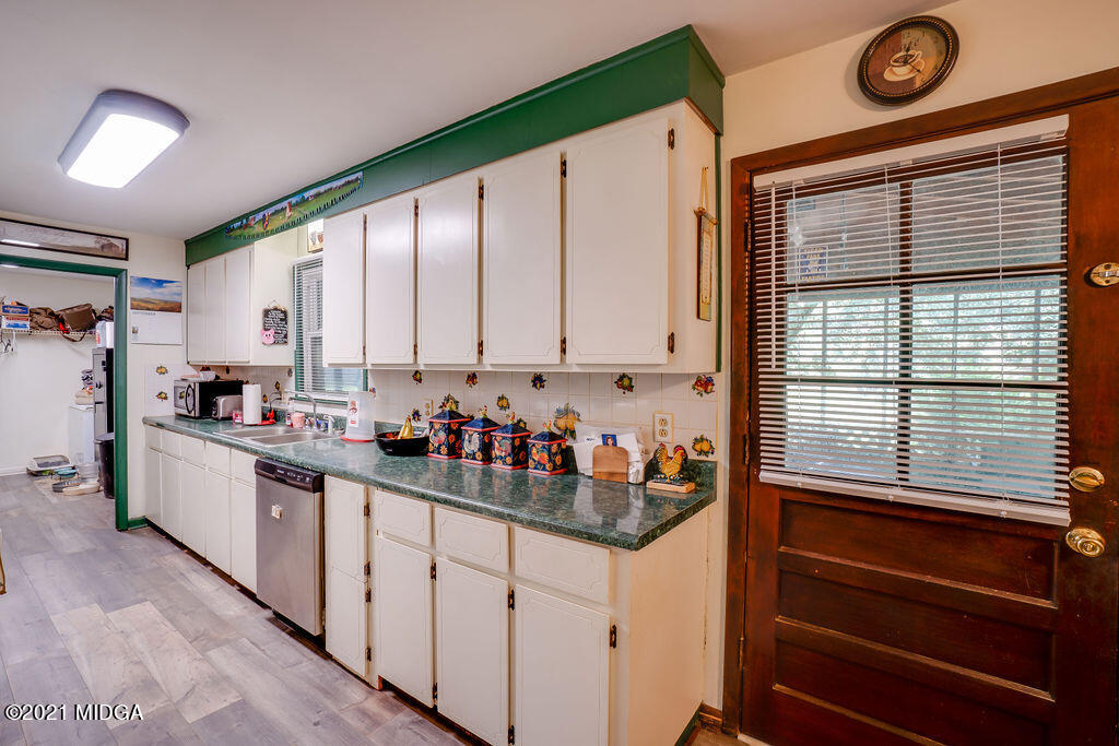 156 Walton Road Fort Valley, GA 31030 - Photo 13 of 61 a kitchen with sink cabinets and window