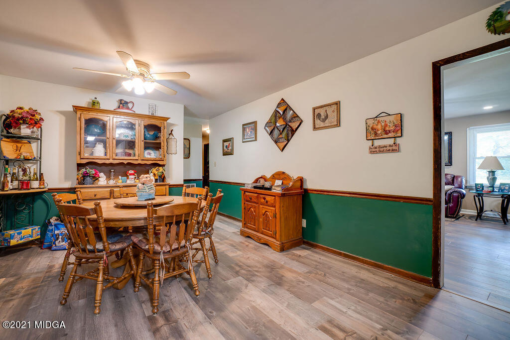 156 Walton Road Fort Valley, GA 31030 - Photo 20 of 61 a view of a dining room with furniture and wooden floor
