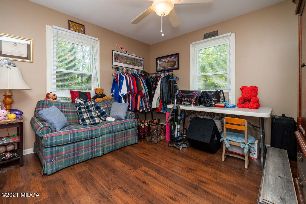156 Walton Road Fort Valley, GA 31030 - Photo 29 of 61 a living room filled with furniture and a window