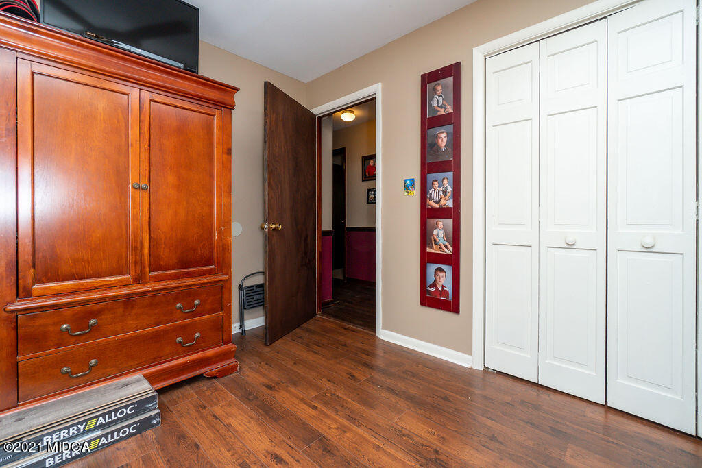 156 Walton Road Fort Valley, GA 31030 - Photo 31 of 61 wooden floor with white walls