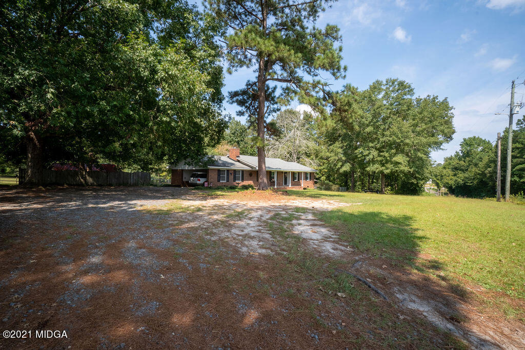 156 Walton Road Fort Valley, GA 31030 - Photo 40 of 61 a view of street with large trees