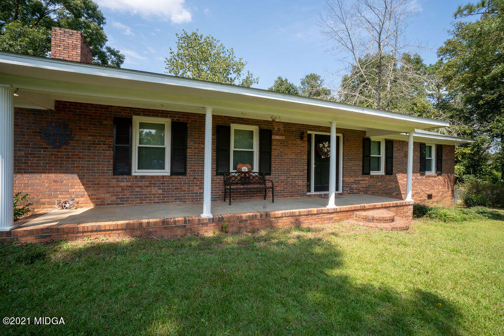 156 Walton Road Fort Valley, GA 31030 - Photo 46 of 61 front view of a house with a yard