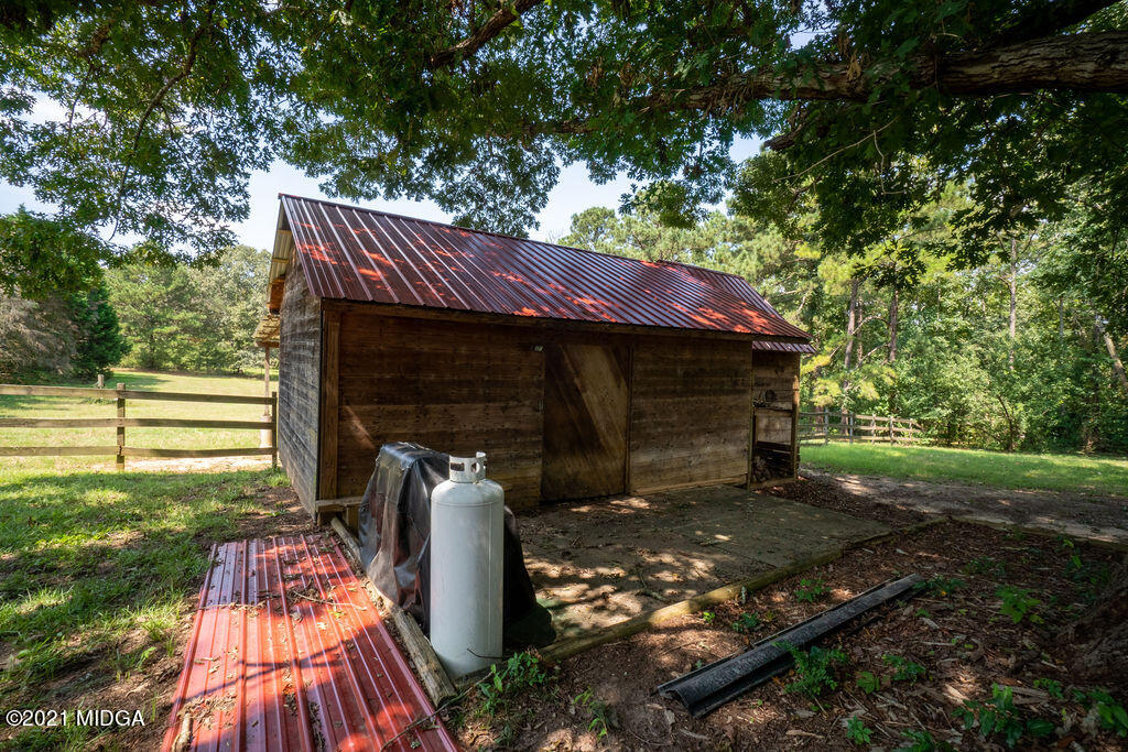 156 Walton Road Fort Valley, GA 31030 - Photo 49 of 61 a view of a small house with yard
