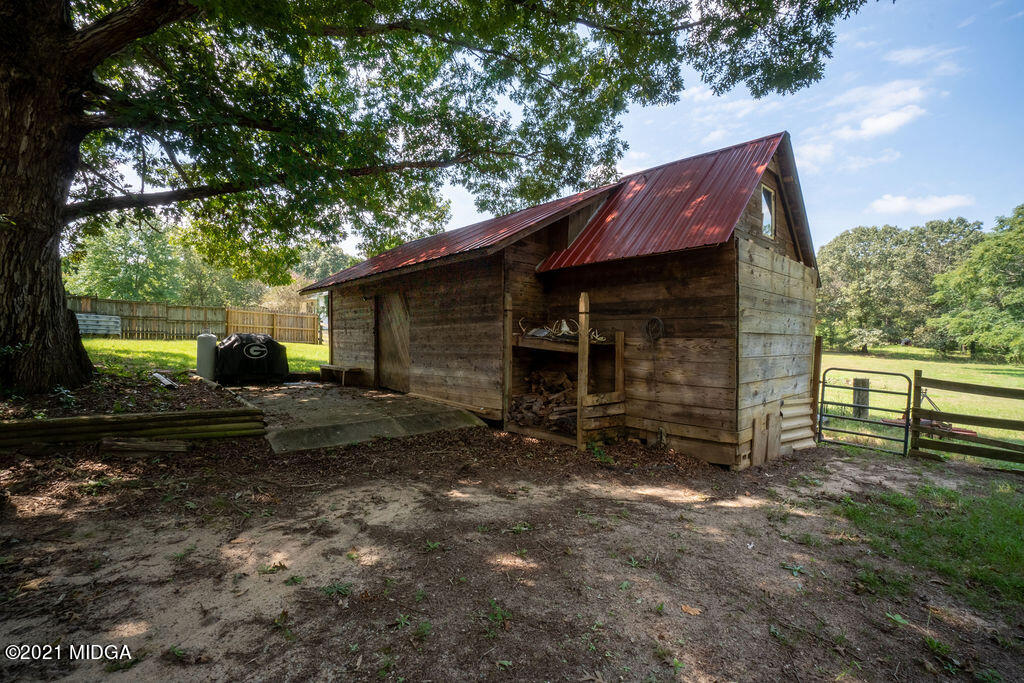 156 Walton Road Fort Valley, GA 31030 - Photo 50 of 61 a view of a house with a yard