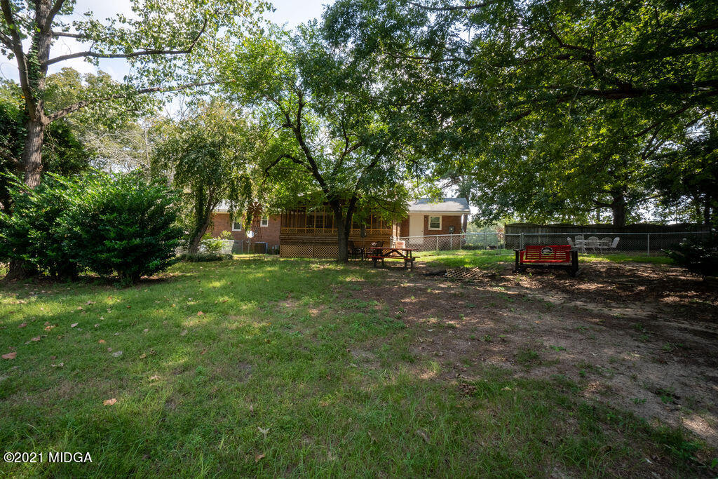 156 Walton Road Fort Valley, GA 31030 - Photo 52 of 61 a view of a house with backyard and sitting area