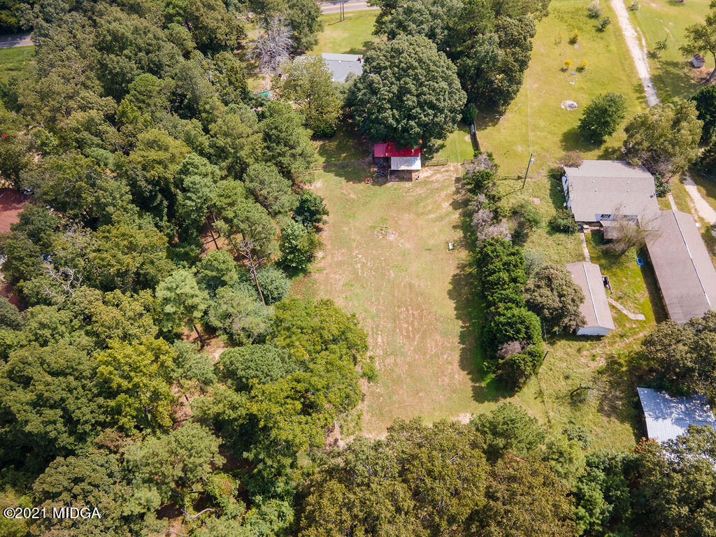 156 Walton Road Fort Valley, GA 31030 - Photo 57 of 61 an aerial view of residential house with outdoor space and trees all around