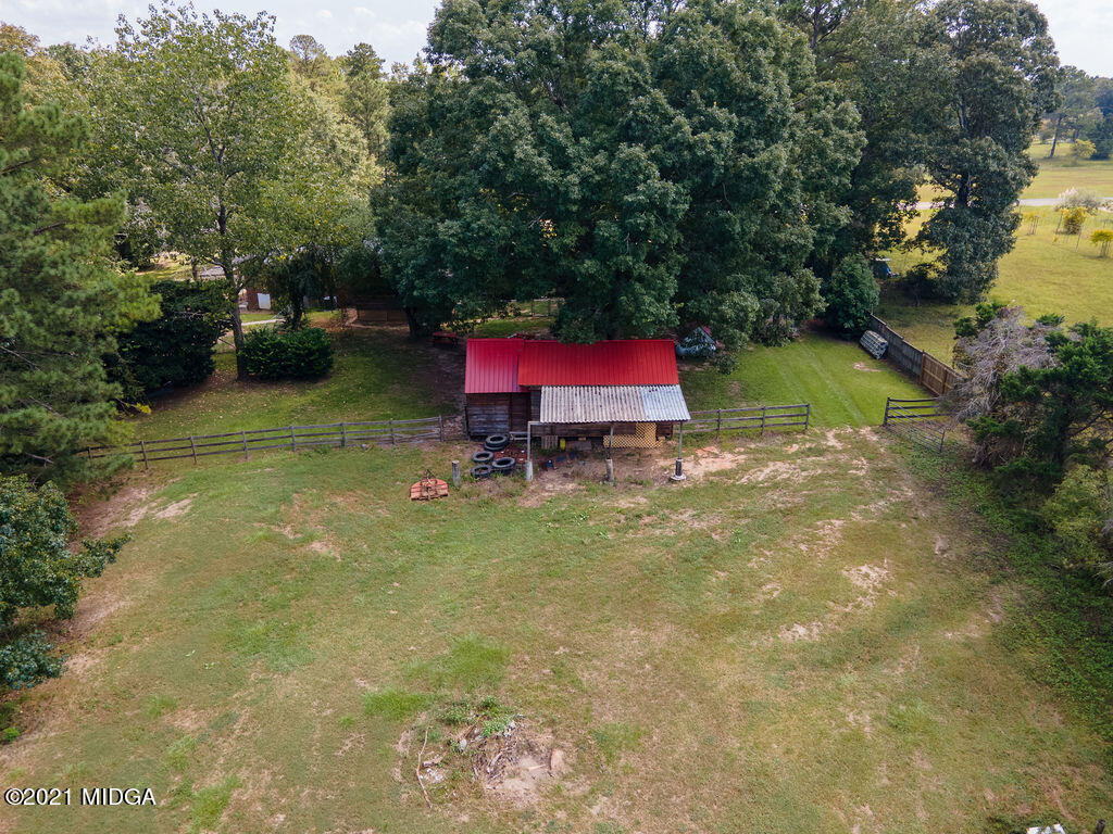 156 Walton Road Fort Valley, GA 31030 - Photo 61 of 61 a view of a backyard with table and chairs
