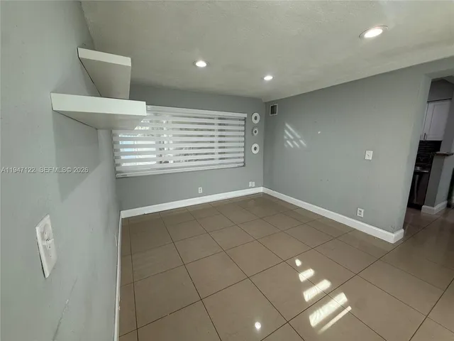 a view of a livingroom with a staircase