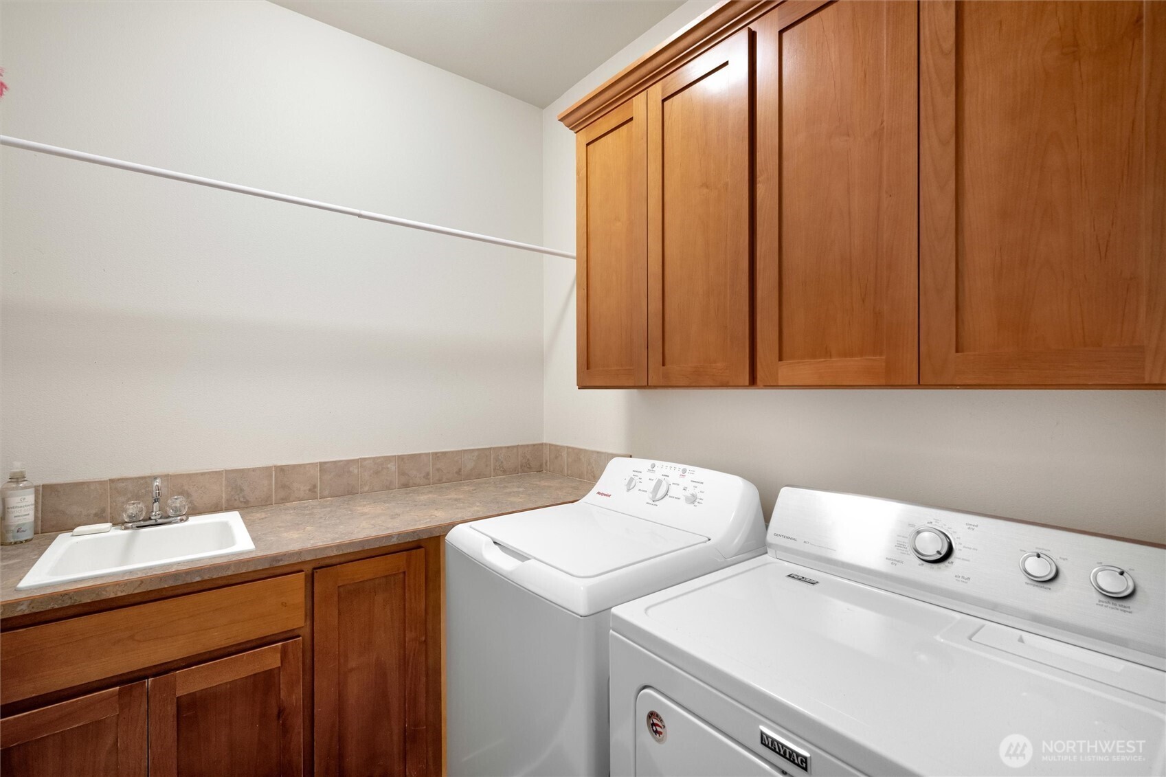 8148 Quinault Road Blaine, WA 98230 - Photo 14 of 40 a utility room with dryer and washer