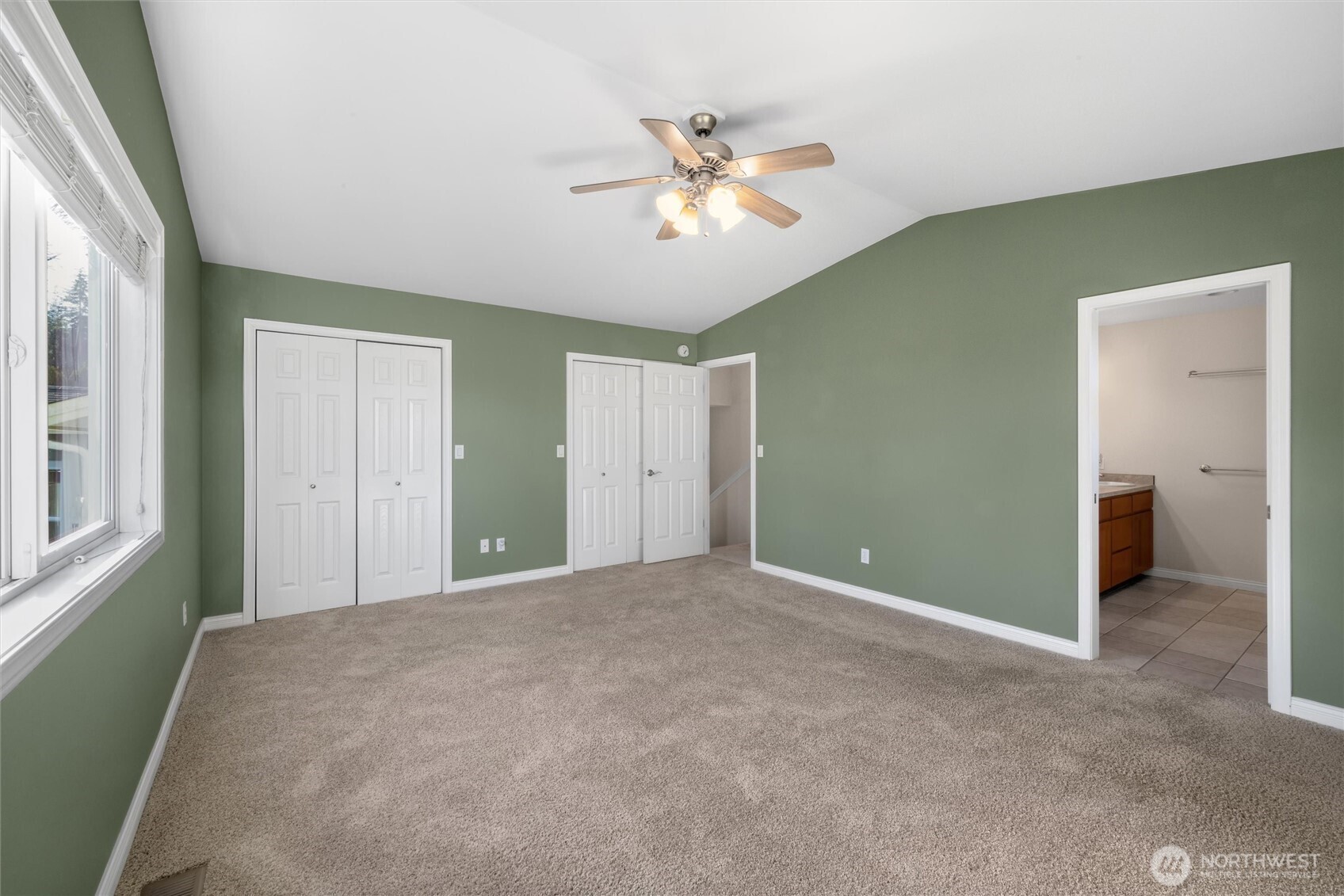 8148 Quinault Road Blaine, WA 98230 - Photo 17 of 40 a view of an empty room with a window