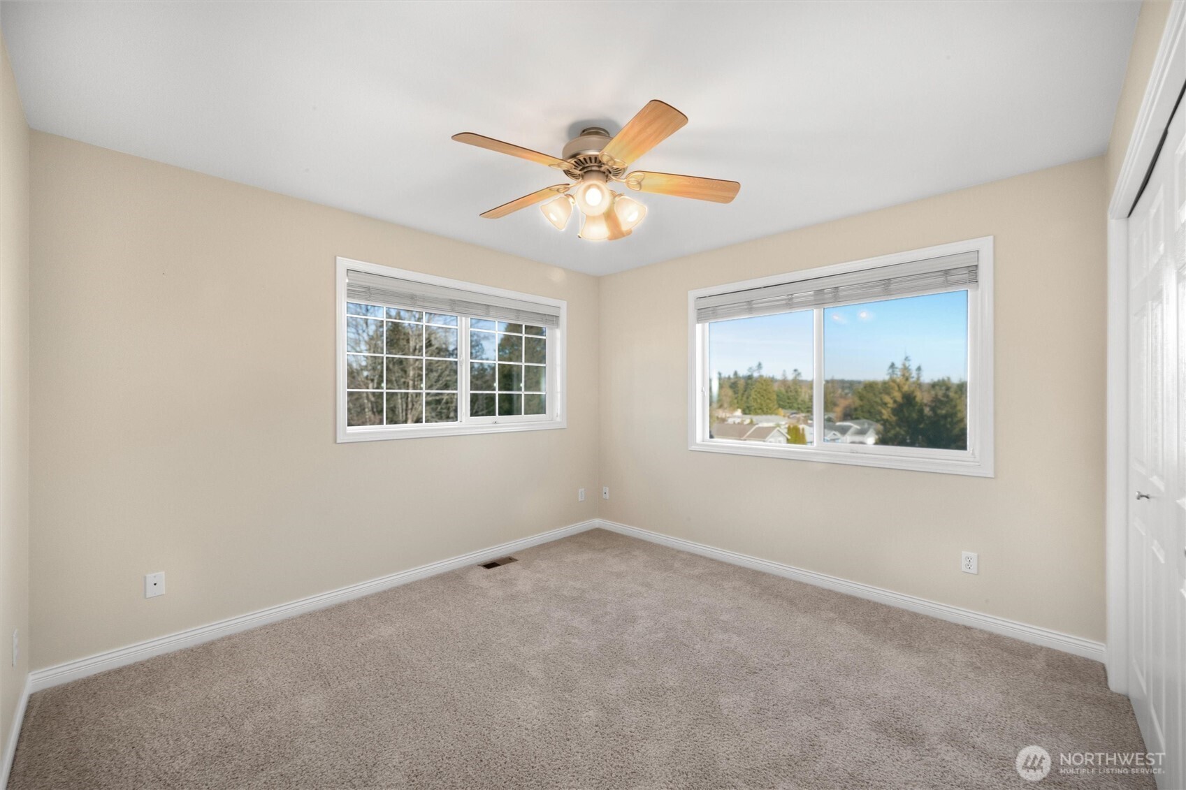 8148 Quinault Road Blaine, WA 98230 - Photo 21 of 40 a view of an empty room with a window